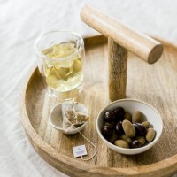 Ronde serveerplank met houten handvat